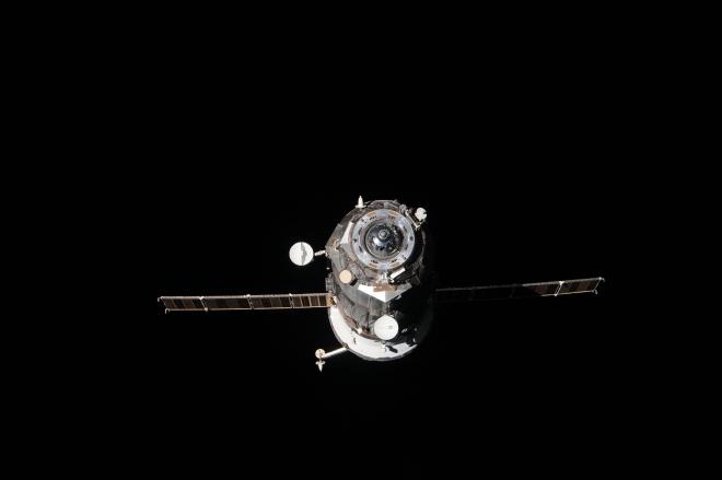 A Progress spacecraft depicted against the blackness of space